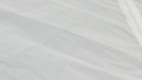 El chef griego Samm Petrichos prepara una comida greco-mexicana el psado 5 de julio 2015, en un mercado de agricultores en Chicago.