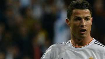 Cristiano Ronaldo y Lionel Messi durante un juego entre Barcelona y Real Madrid, hace tres años.