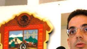 Fue procurador del Estado de México, cuando Enrique Peña Nieto era gobernador.