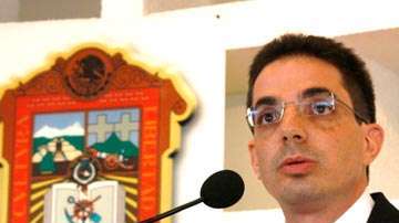 Fue procurador del Estado de México, cuando Enrique Peña Nieto era gobernador.