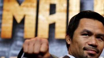 El boxeador filipino Manny Pacquiao y el campeón welter de la Asociación Mundial de Boxeo, el argentino Lucas Matthysse. (Foto: EFE/ Francis R. Malasig)