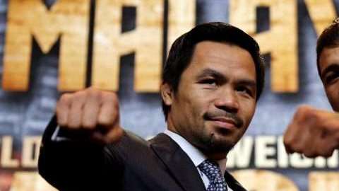 El boxeador filipino Manny Pacquiao y el campeón welter de la Asociación Mundial de Boxeo, el argentino Lucas Matthysse. (Foto: EFE/ Francis R. Malasig)