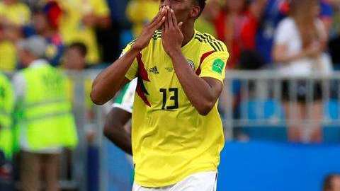 Yerry Mina celebra el gol de la clasificación. EFE