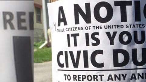 "Es tu deber reportar a extranjeros indocumentados", dice parte del cartel.