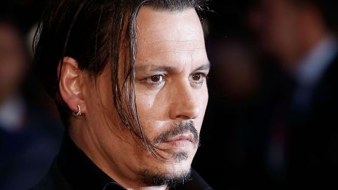 Johnny Depp evita ir a juicio.