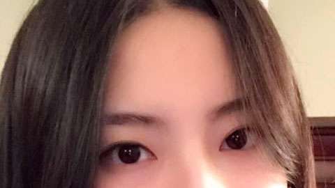 Jingjing Hu fue retirada del avión de American Airlines.