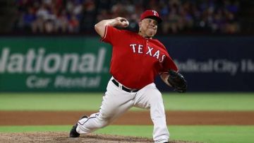 Bartolo Colon de los Texas Rangers ya es el pitcher latino con más victorias en las Mayores.  (Foto: Ronald Martinez/Getty Images)