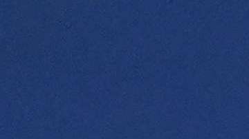 Nadal devuelve un servicio de Pospisil.