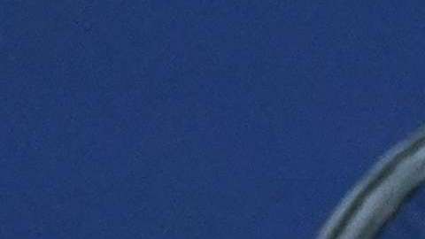 Nadal devuelve un servicio de Pospisil.