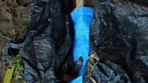 Los investigadores también encontraron 200 prendas, más de 100 carnés de identificación y otros objetos personales.