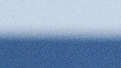 Novak Djokovic devuelve una bola a Joao Sousa.