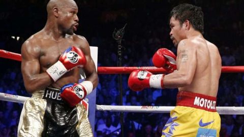 Floyd Mayweather Jr. y Manny Pacquiao se verán nuevamente las caras. (Foto: JOHN GURZINKSI/AFP/Getty Images)