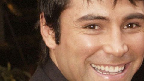 Millie Corretjer y Óscar de la Hoya en 2003.