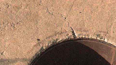 La Policía descubrió el cadáver de la mujer en un pozo.