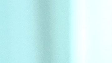 El Presidente Donald Trump sostiene una foto con el escrito "diseño típico estandar del muro" durante una reunión en la Casa Blanca.