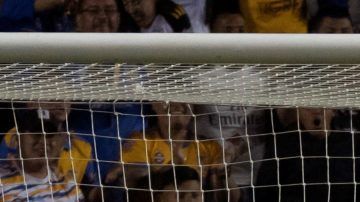 Jugadores de Tigres festejan el triunfo ante Deportivo Saprissa en la vuelta de octavos de Concachampíons.