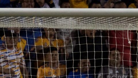 Jugadores de Tigres festejan el triunfo ante Deportivo Saprissa en la vuelta de octavos de Concachampíons.
