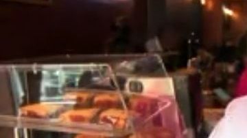 Ethan Nwanganga en uno de sus locales