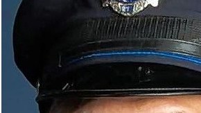 Oficial de Policía de Aurora Ramón López nombrado empleado del mes por brindarle ayuda a una familia atrapada en un vehículo sumergido en un río.