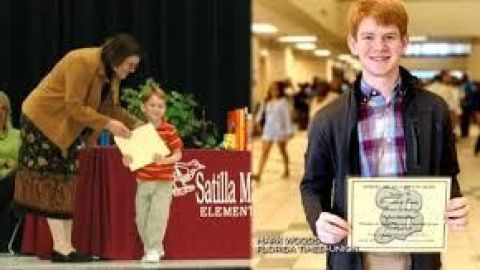 Alex Kunda recibiendo los diplomas de asitencia perfecta.