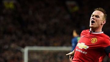 MANCHESTER, ENGLAND - MARCH 09:  Wayne Rooney of Manchester United celebrates after scoring a goal to level the scores at 1-1 during the FA Cup Quarter Final match between Manchester United and Arsenal at Old Trafford on March 9, 2015 in Manchester, England.  (Photo by Laurence Griffiths/Getty Images)
