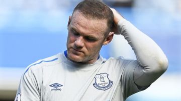 Wayne Rooney fue captado en un hotel con una mujer que no era su esposa.