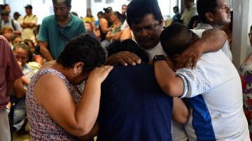 Familiares de los fallecidos en el tiroteo a un bar en Coatzacoalcos, en Veracruz.