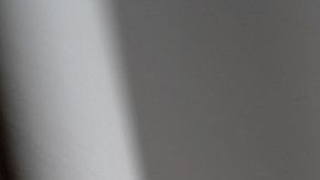 Hands on prison bars