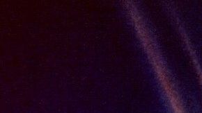 La imagen de un artista de un asteroide que se estrella contra los mares poco profundos de la península de Yucatán.