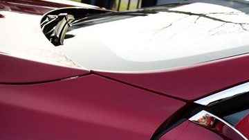 epa04049808 Elon Musk, co-founder and CEO of Tesla, poses with a model of the brand during a visit to Amsterdam, The Netherlands, 31 January 2014. The European Tesla Service is based in Tilburg and the European headquarters in Amsterdam.  EPA/JERRY LAMPEN 0