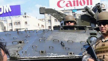 El ejército patrullaba las calles de Santiago este sábado.