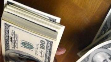 El valor de las monedas en dólares es $12,000.