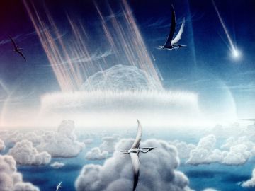 La imagen de un artista de un asteroide que se estrella contra los mares poco profundos de la península de Yucatán.