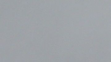 Un tanque turco pasa por una zona bombardeada en Siria.