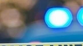 Escena del crimen acordonada por la Policia.