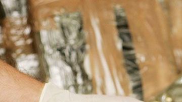 Paquetes de cocaina confiscada.