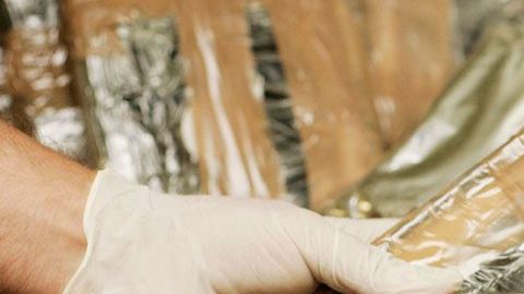 Paquetes de cocaina confiscada.