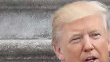 La ex primera dama Michelle Obama y Donald Trump.