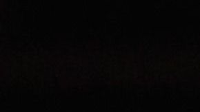 La reina Isabel II al lado de Meghan Markle.