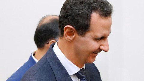 En la imagen, el presidente sirio y el líder religioso de Irán.