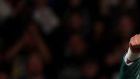 Andrade luce su campeonato de NXT antes de llegar al roster principal.