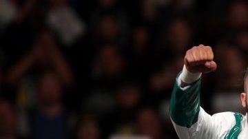 Andrade luce su campeonato de NXT antes de llegar al roster principal.