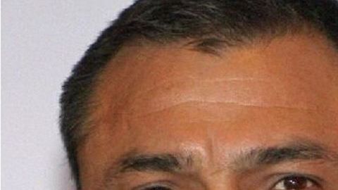 Genaro García Luna y Joaquín "El Chapo" Guzmán Loera.