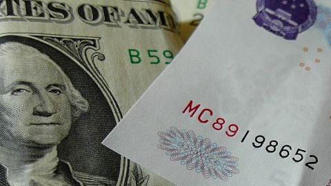 El yuan chino y el dólar estadounidense.