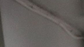 Trabajadores en una fábrica de mascarillas en Nantong (China)