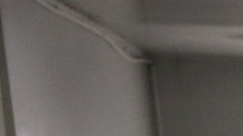 Trabajadores en una fábrica de mascarillas en Nantong (China)