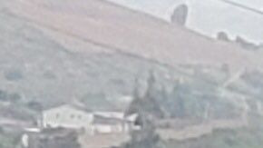 Bomberos en escena donde se volcó el autobús en San Diego.