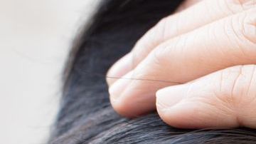 Mujer con problema de cabello