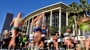 LOS ANGELES, CA - FEBRUARY 14:  Participants run past the Dorothy Chandler Pavilion and the Los Angeles Music Center during the 2016 Skechers Performance Los Angeles Marathon on February 14, 2016 in Los Angeles, California.  (Photo by Jonathan Moore/Getty Images)