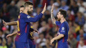 Los capitanes del Barcelona, Lionel Messi y Gerard Piqué.